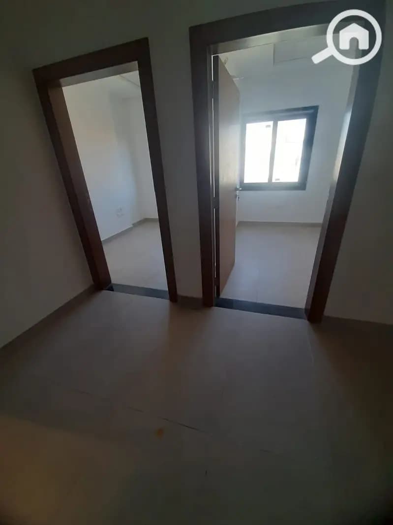 clinic fully finished 2 rooms for sale in sway mall direct on mohamed naguib Axis - new cairo