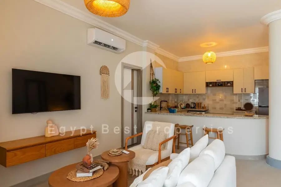 3-bedroom chalet with a double view overlooking an open lagoon, fully finished, with a 5% down payment and near delivery.