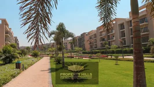 For sale, a fully furnished apartment in front of Sphinx Airport next to Sodic in Marvel Al-Marasem with the longest payment period.