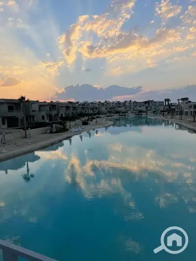 A fully finished chalet with air conditioning and kitchen is for sale in Ras El Hekma by Azha North Coast, with a 10-year installment plan.